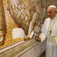 Illustration for article titled Pope Spends Afternoon Filling In Glory Holes All Over St. Peter’s Basilicaem/em